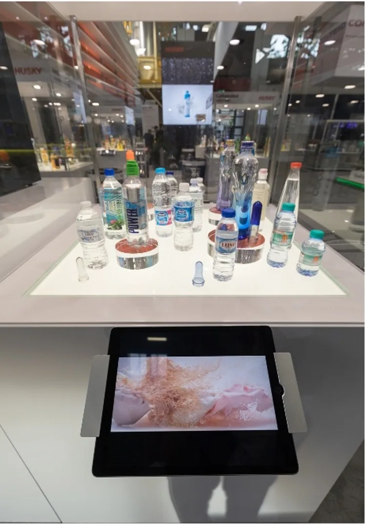 Water-bottle and packaging samples displayed with product-launch video