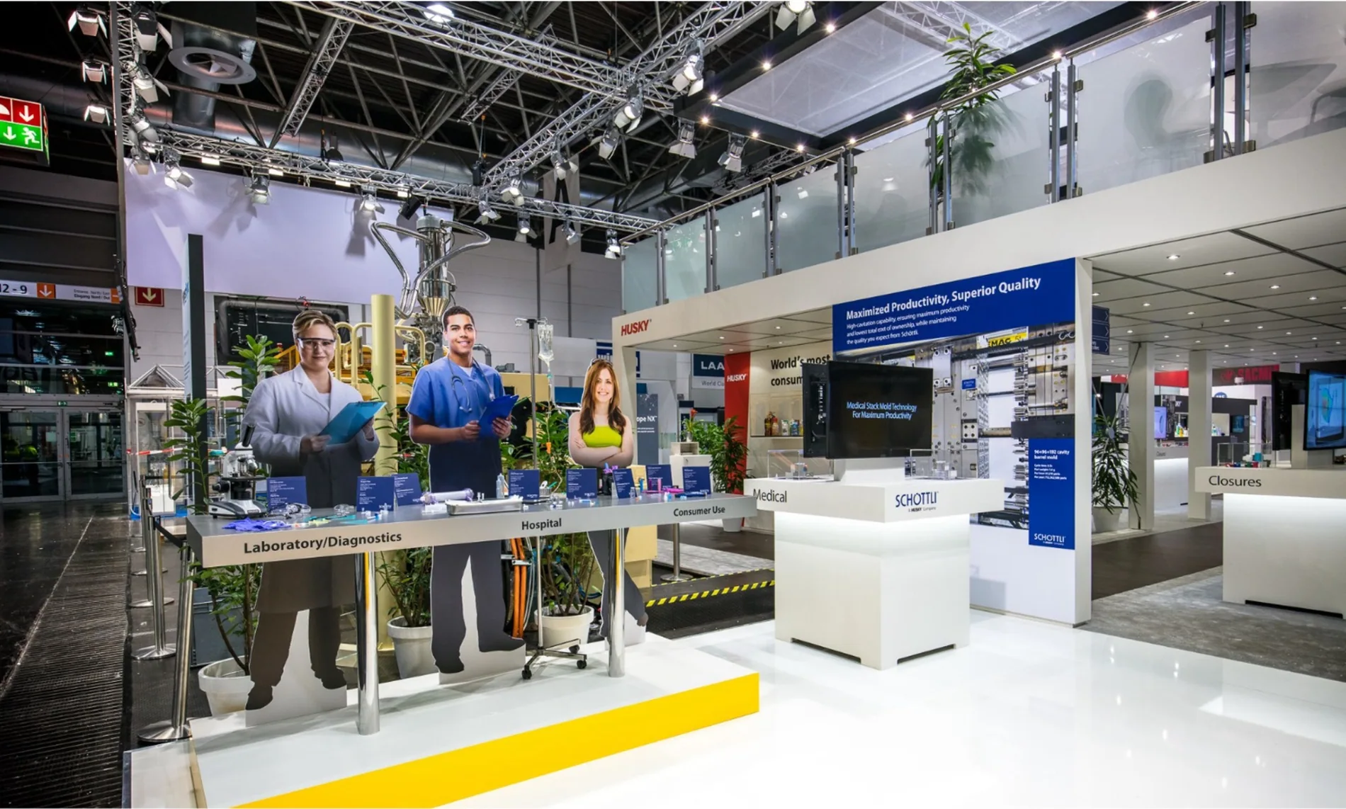 Schöttli medical plastics demonstration and exhibit within Husky stand
