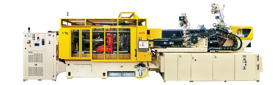 Large yellow Husky injection moulding equipment product photograph